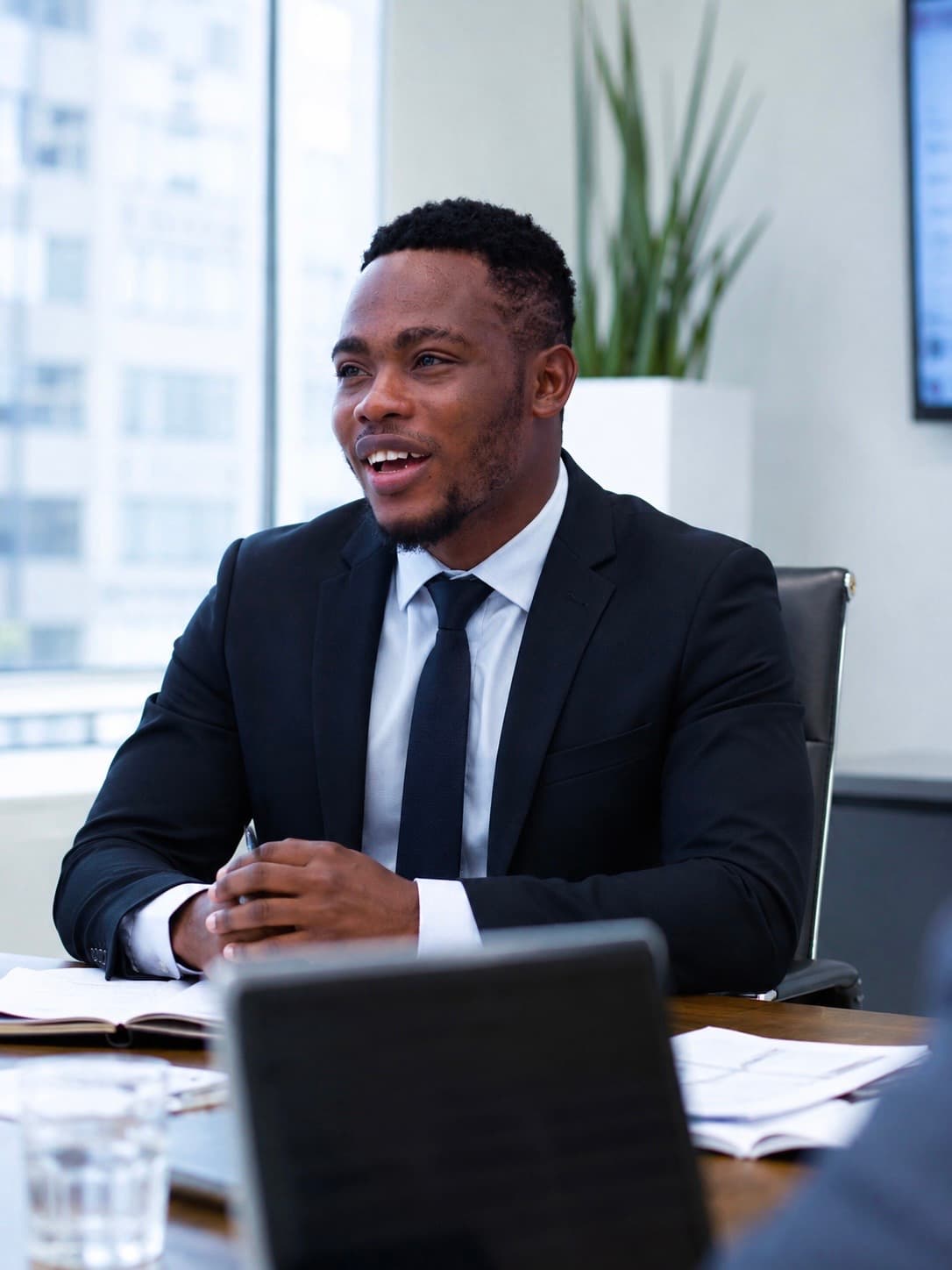 Andrew Amevor in an executive meeting